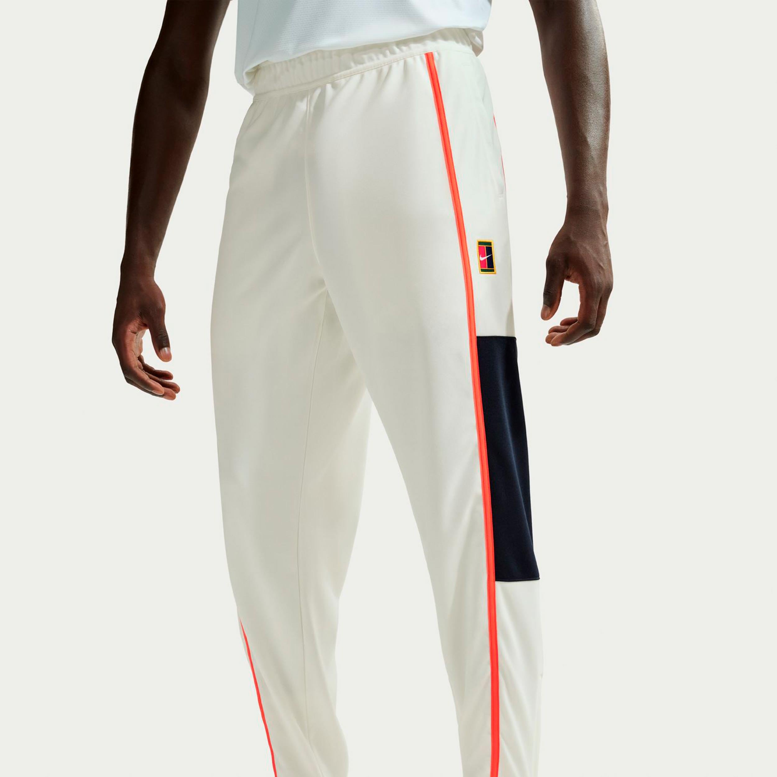 Nike Court Heritage Trainingshose Herren-creme, orange