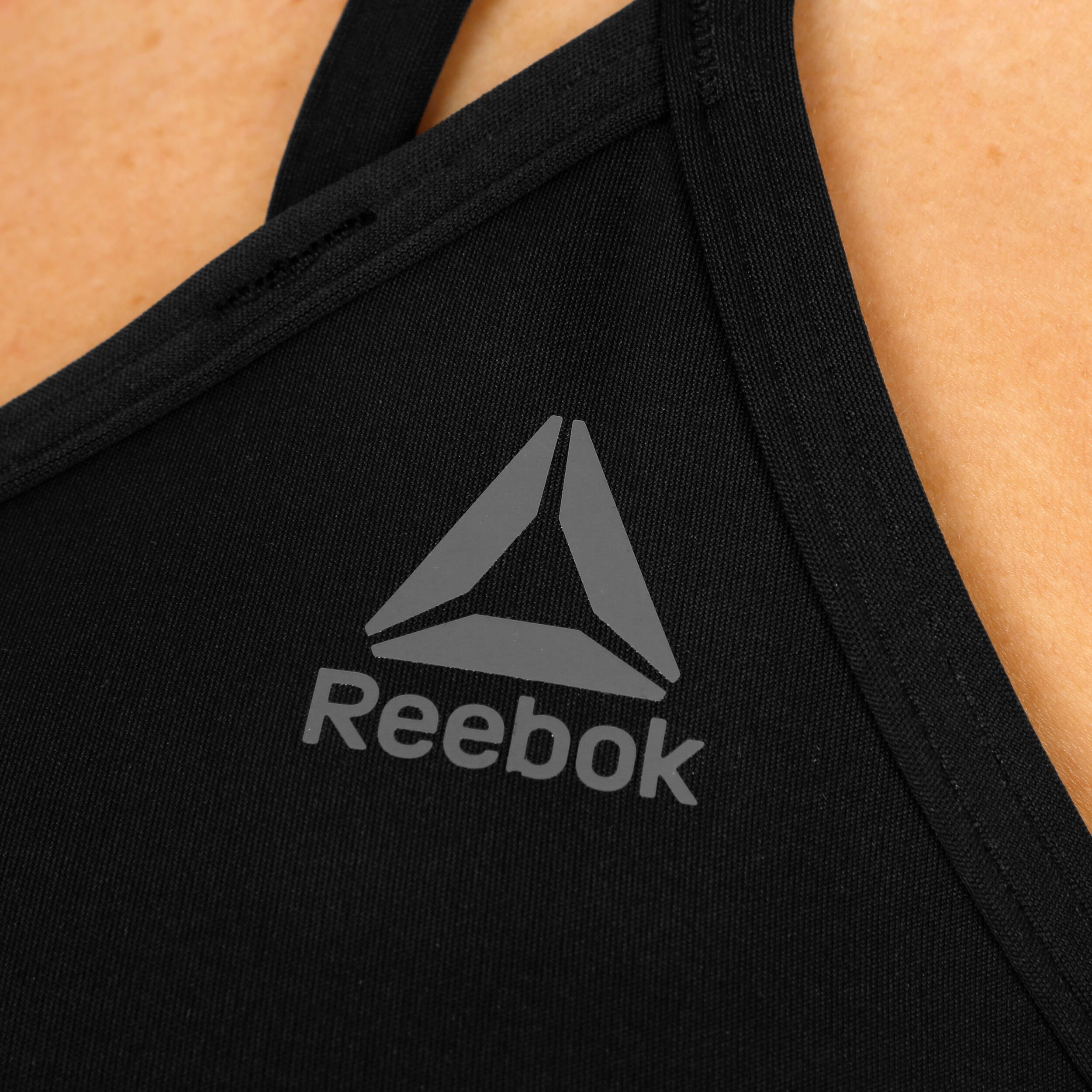 Reebok Hero Strappy Padded Sport BH Damen Schwarz Grau online kaufen Tennis Point AT